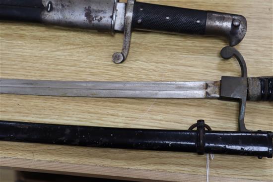 A bayonet and a Naval sword